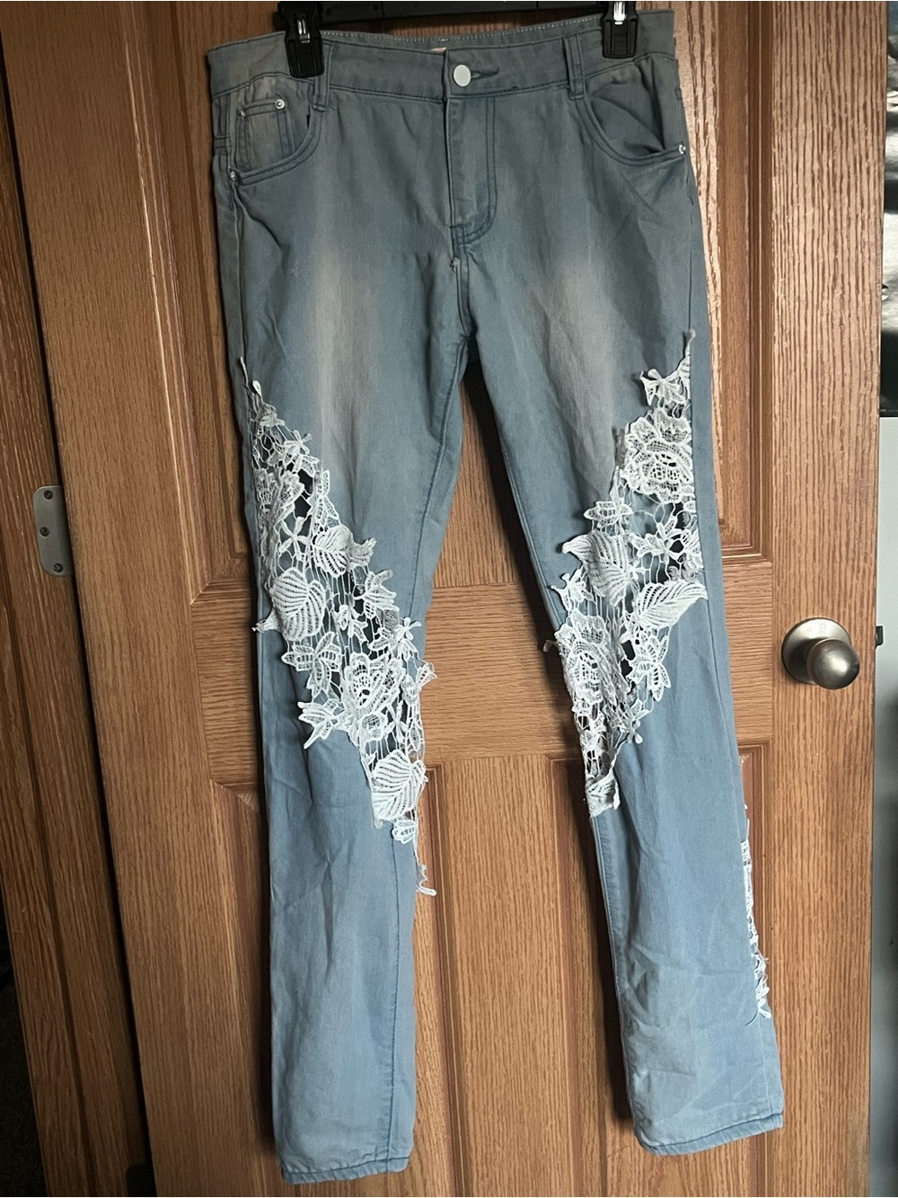 Women's Light Blue Jeans with White Lace Detailing